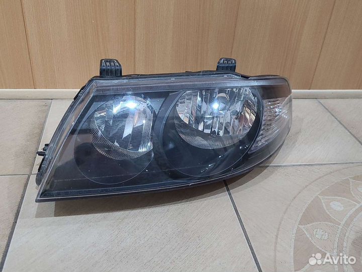 Фара левая Nissan Almera Classic