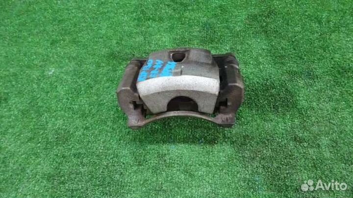 Суппорт передний правый Toyota Vitz KSP130 1KR-FE