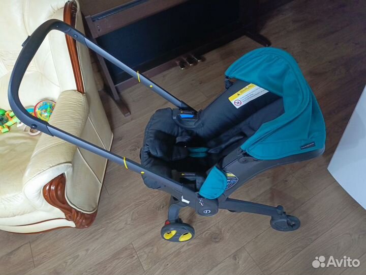 Автолюлька на колесах для новорожденных