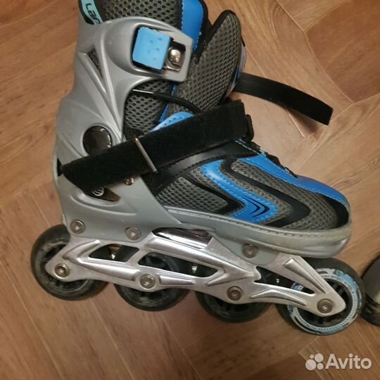 Роликовые коньки