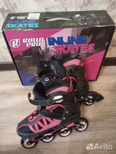 Роликовые коньки