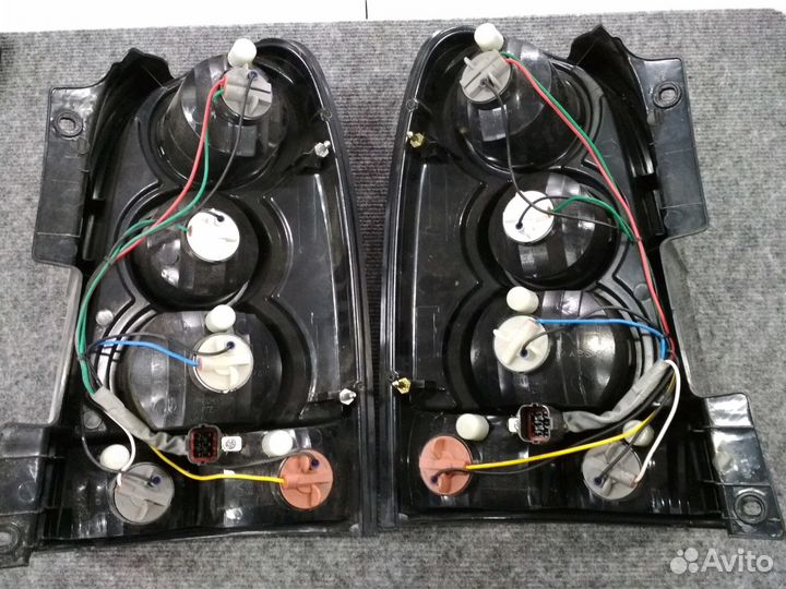 Фонари Ssang Yong Rexton1 Оригинал новые