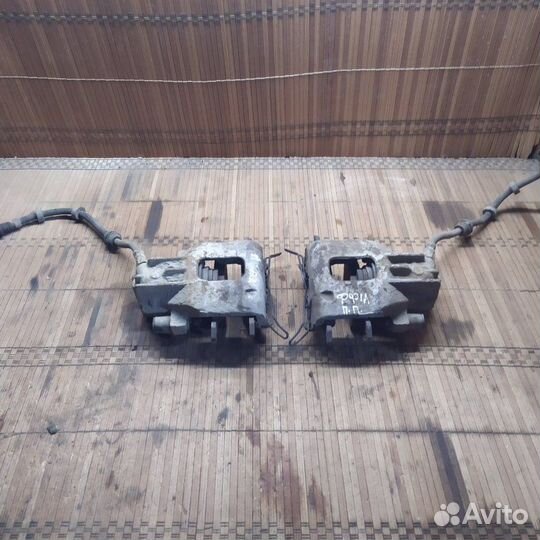 Суппорт тормозной передний Ford Focus 1 седан 2.0