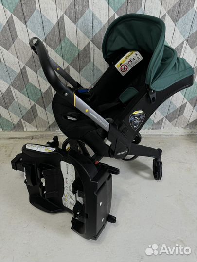 Коляска автокресло doona с базой isofix
