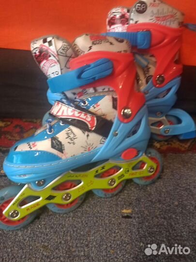 Роликовые коньки