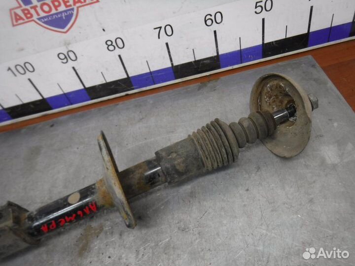 Амортизатор передний левый Nissan Almera G15 K4M