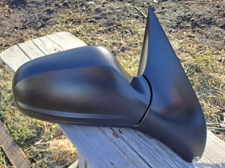 Левое зеркало заднего вида на Опель астра н