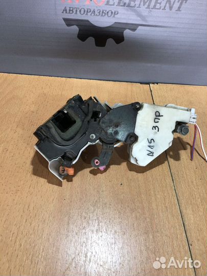 Замок задний правый Nissan Almera N15