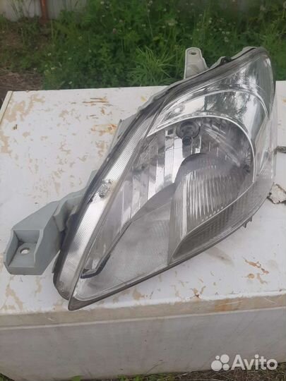 Фара toyota Belta