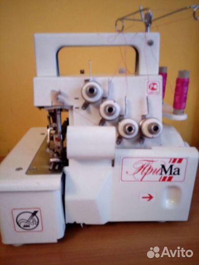 Оверлок швейная машина