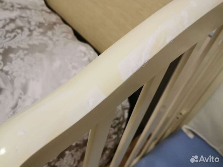 Детская кроватка с продольным маятником