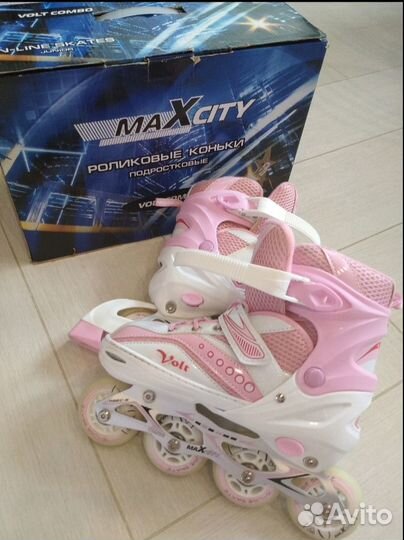Роликовые коньки раздвижные (почти новые)