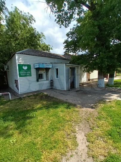 Нежилое здание с земельным участком