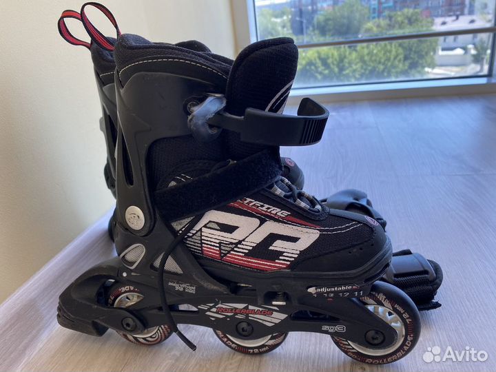 Роликовые коньки