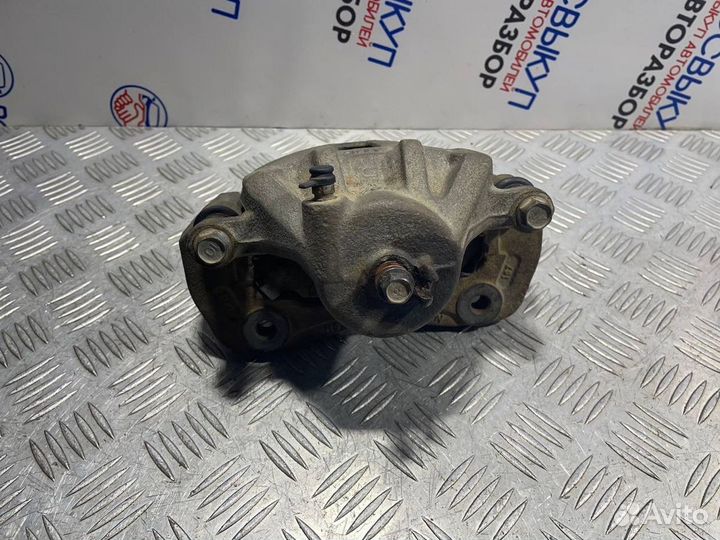 Суппорт тормозной передний левый Kia Soul 1