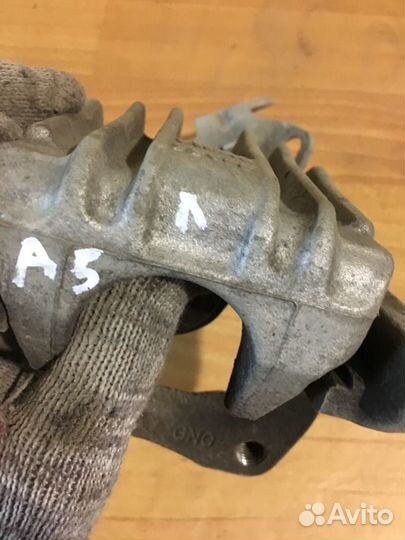 Шкода Октавия суппорт задний левый 1K0615423