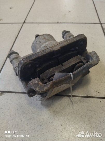 Суппорт тормозной передний правый Kia Picanto 1