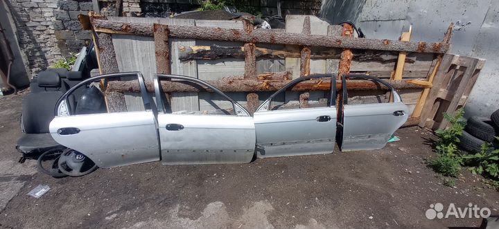 Двери Киа shuma