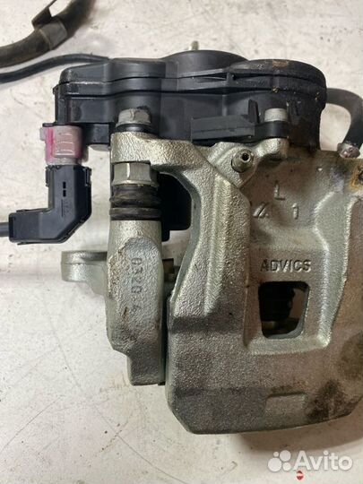 Суппорт тормозной задний левый Mitsubishi