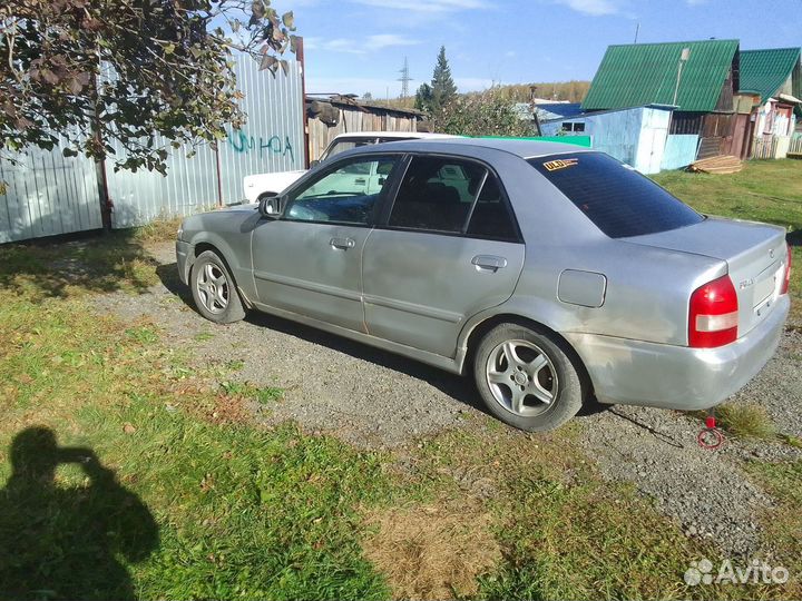 Mazda Familia 1.5 AT, 1999, 300 000 км