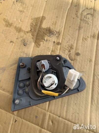 Фонарь левый в крышку багажника Kia Cerato 2