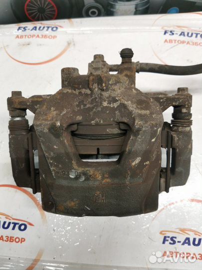 Суппорт тормозной передний левый Opel Astra J