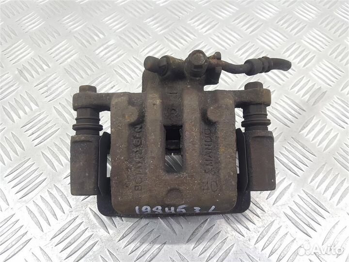 Суппорт задний левый Chevrolet Captiva C100