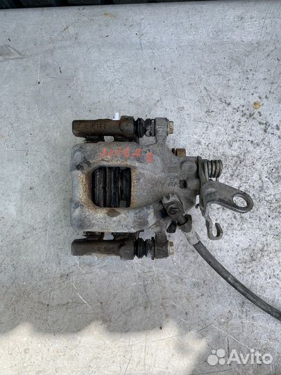 Суппорт зад. левый Mazda 3 BL