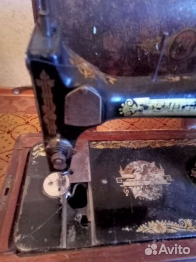 Швейная машина Singer