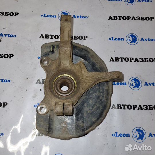 Поворотный кулак передний правый Mitsubishi Lancer