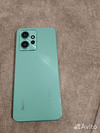 Телефон Redmi 23021