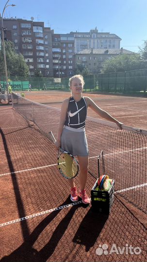 Тренер по большому теннису