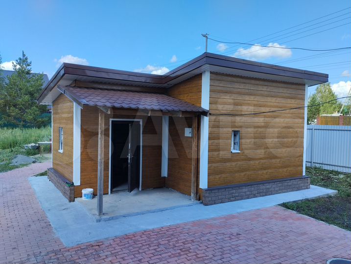 Коттедж 340 м² на участке 15 сот.