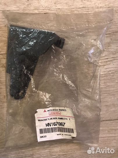 Кронштейн фар левый mitsubishi L200 (KB) (2006)