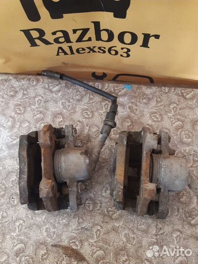 Суппорт тормозной передний LADA Priora 1.6L 16кл