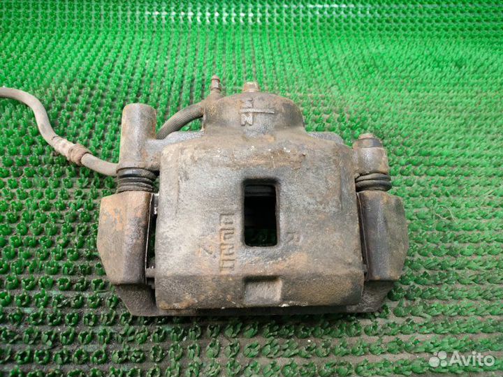 Суппорт передний правый Mazda 626 GE FS 1995