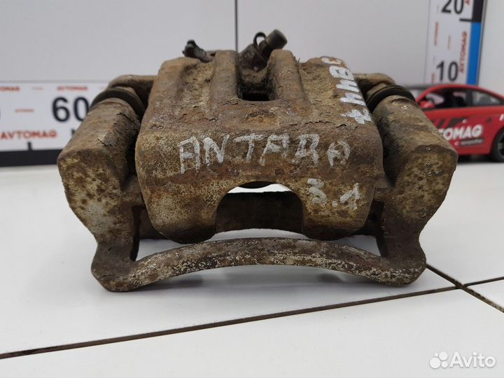 Суппорт задний левый