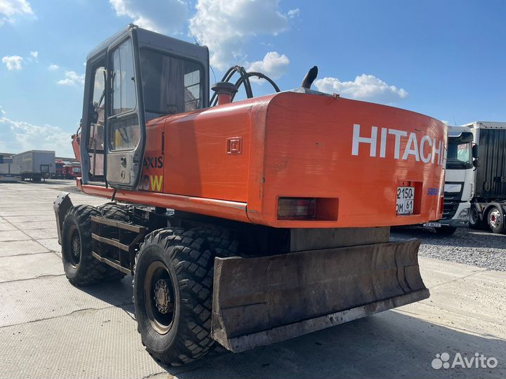 Колёсный экскаватор Hitachi EX160W, 2001