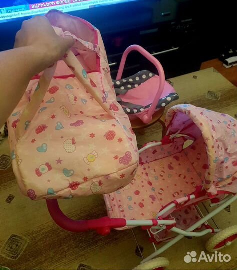 Игрушечная коляска для кукол