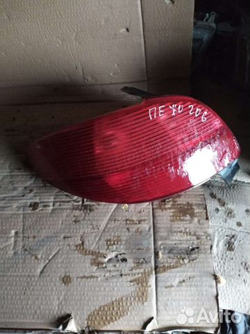 Фонарь левый Peugeot 206