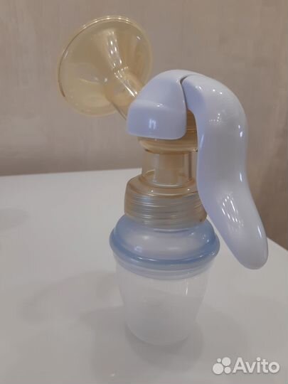 Ручной молокоотсос с системой хранения молока