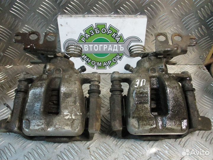 Суппорт тормозной задний L Volkswagen Caddy 3 07г