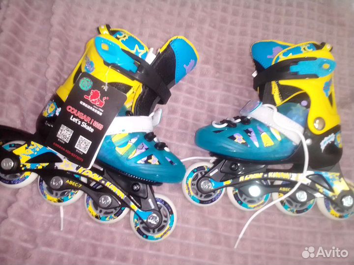 Роликовые коньки