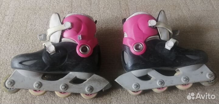 Роликовые коньки