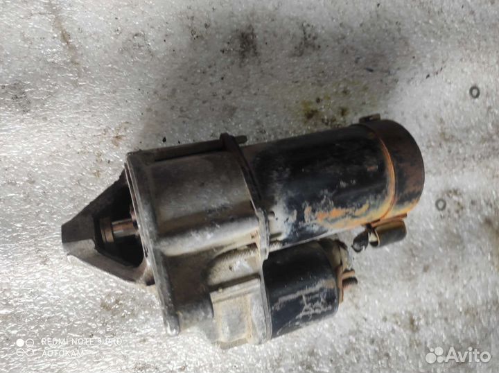 Стартер Mitsubishi Carisma