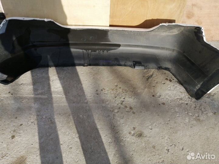 Бампер задний Nissan Tiida C11