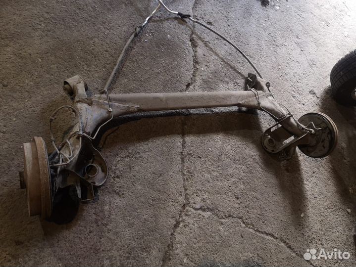 Балка задняя в сборе под барабаны Skoda Rapid Polo