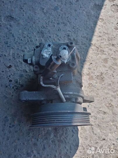 Компрессор кондиционера Kia Clarus