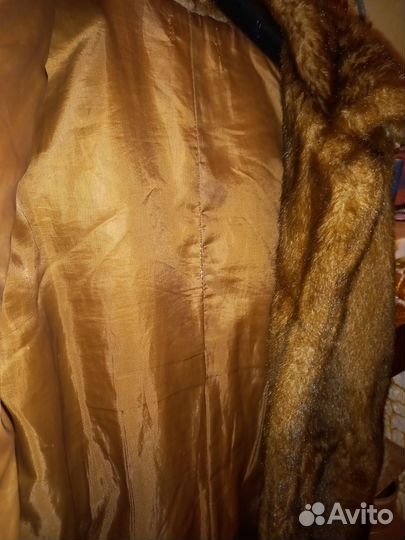 Меховая жилетка