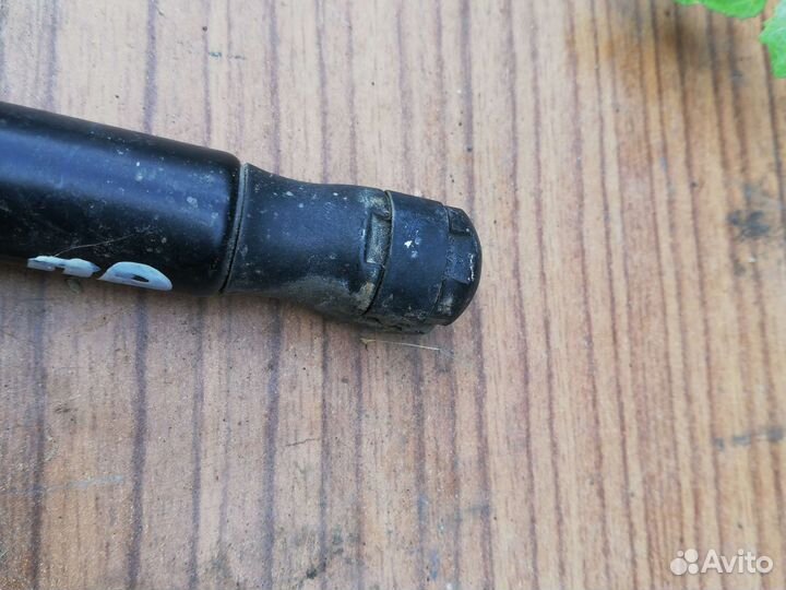 Амортизатор крышки багажника Рено Меган 2